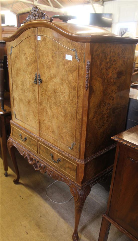 Walnut drinks cabinet on cabriole legs